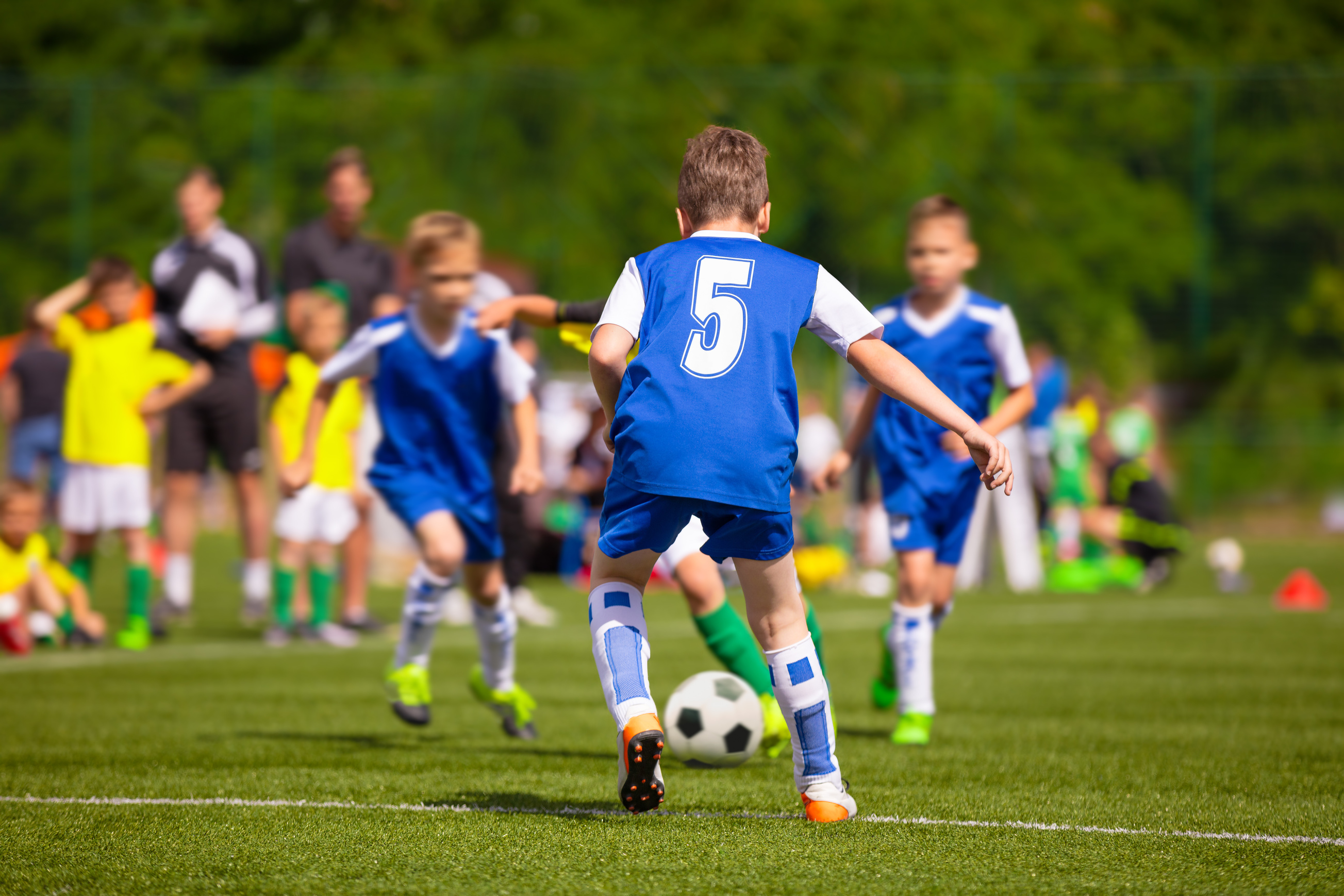 Kids Playing Soccer Game